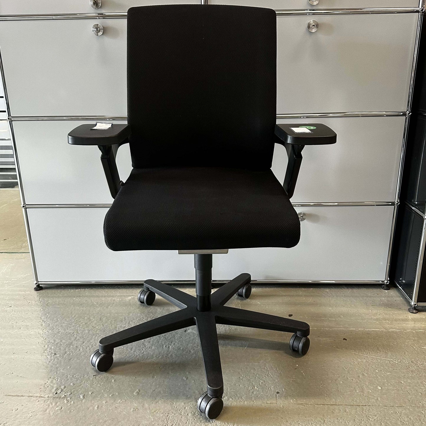 Wilkhahn ON black ergonomic office chair with adjustable seat height, depth, and backrest, featuring lockable backrest and Trimension technology