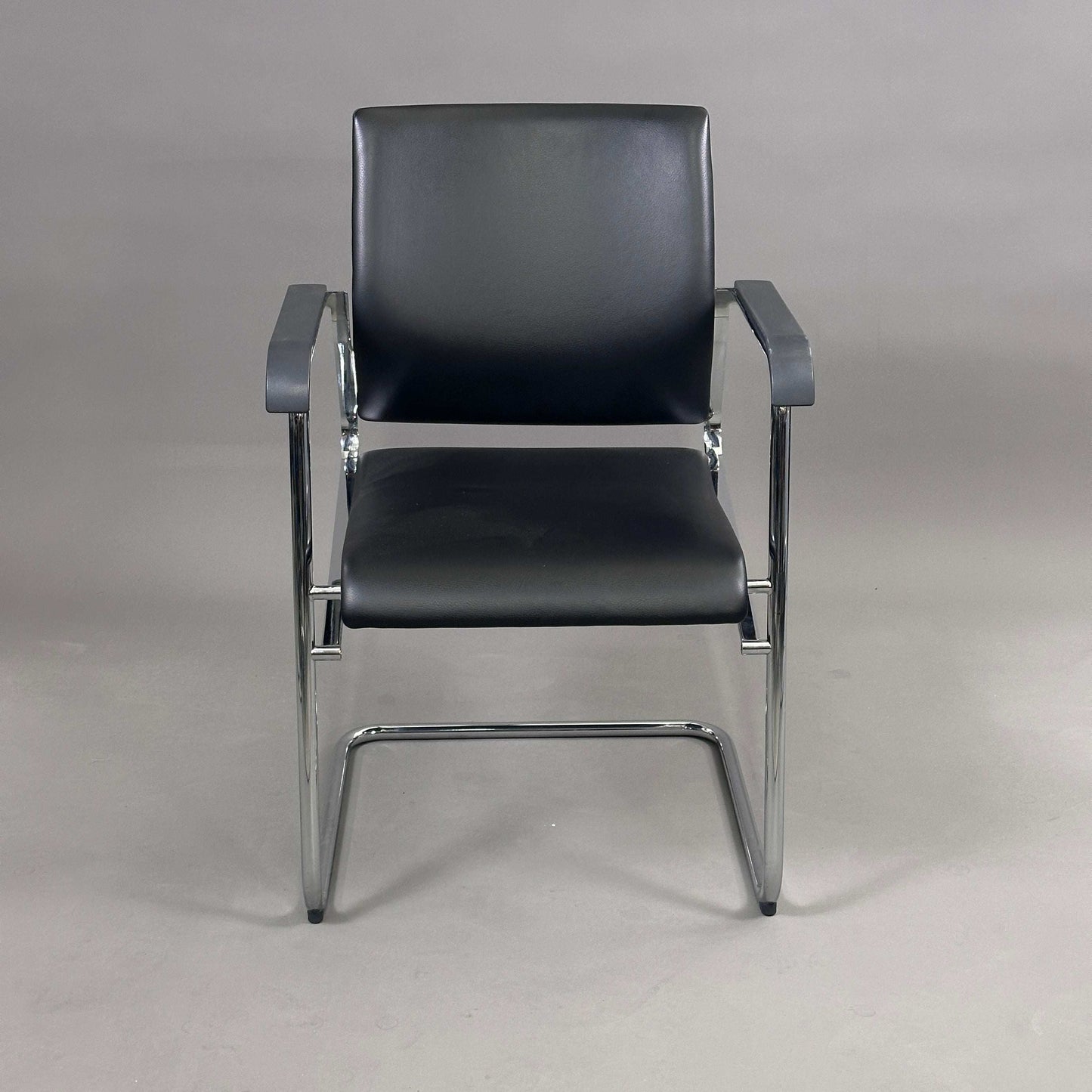 Wilkhahn Sito office chair with black leather seat and chrome frame