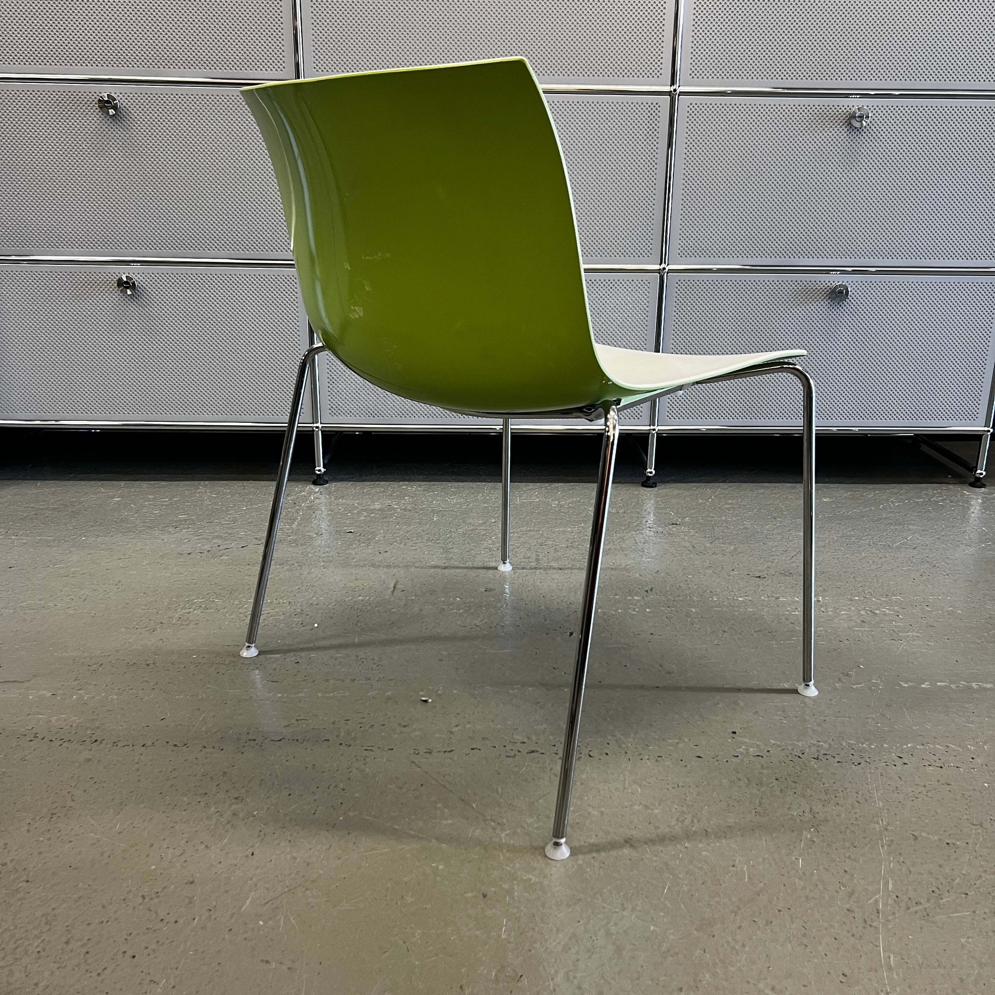 Arper Catifa 53 stackable indoor and outdoor chair in white and light green with chrome legs