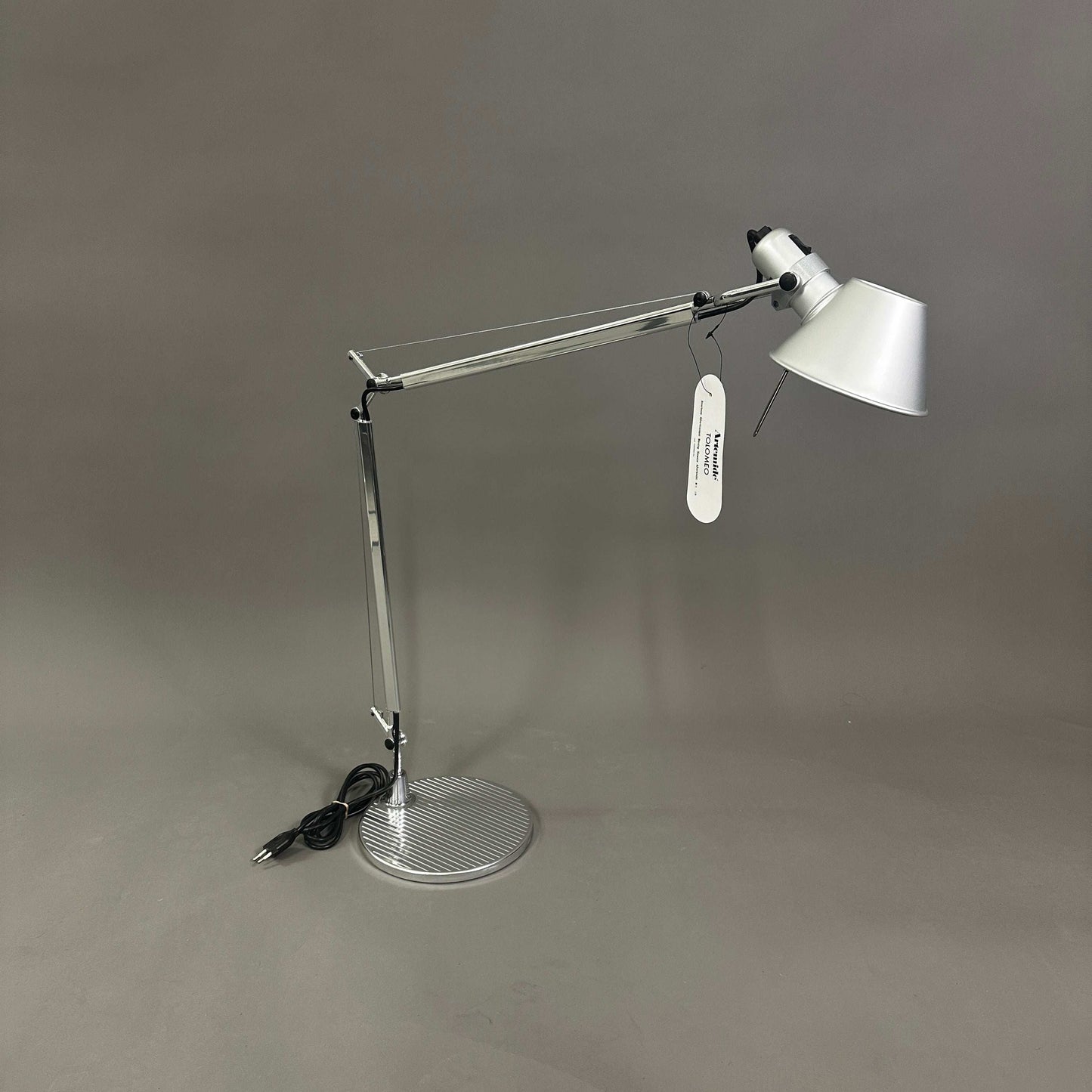 Artemide Tolomeo Tavolo polished aluminum adjustable desk lamp with round stand and conical shade