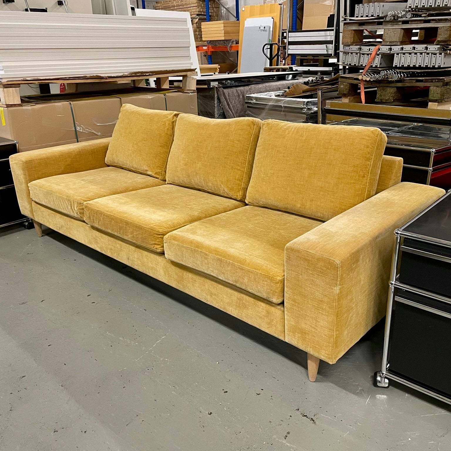 BoConcept Indivi yellow three-seater sofa with modern design and fabric upholstery