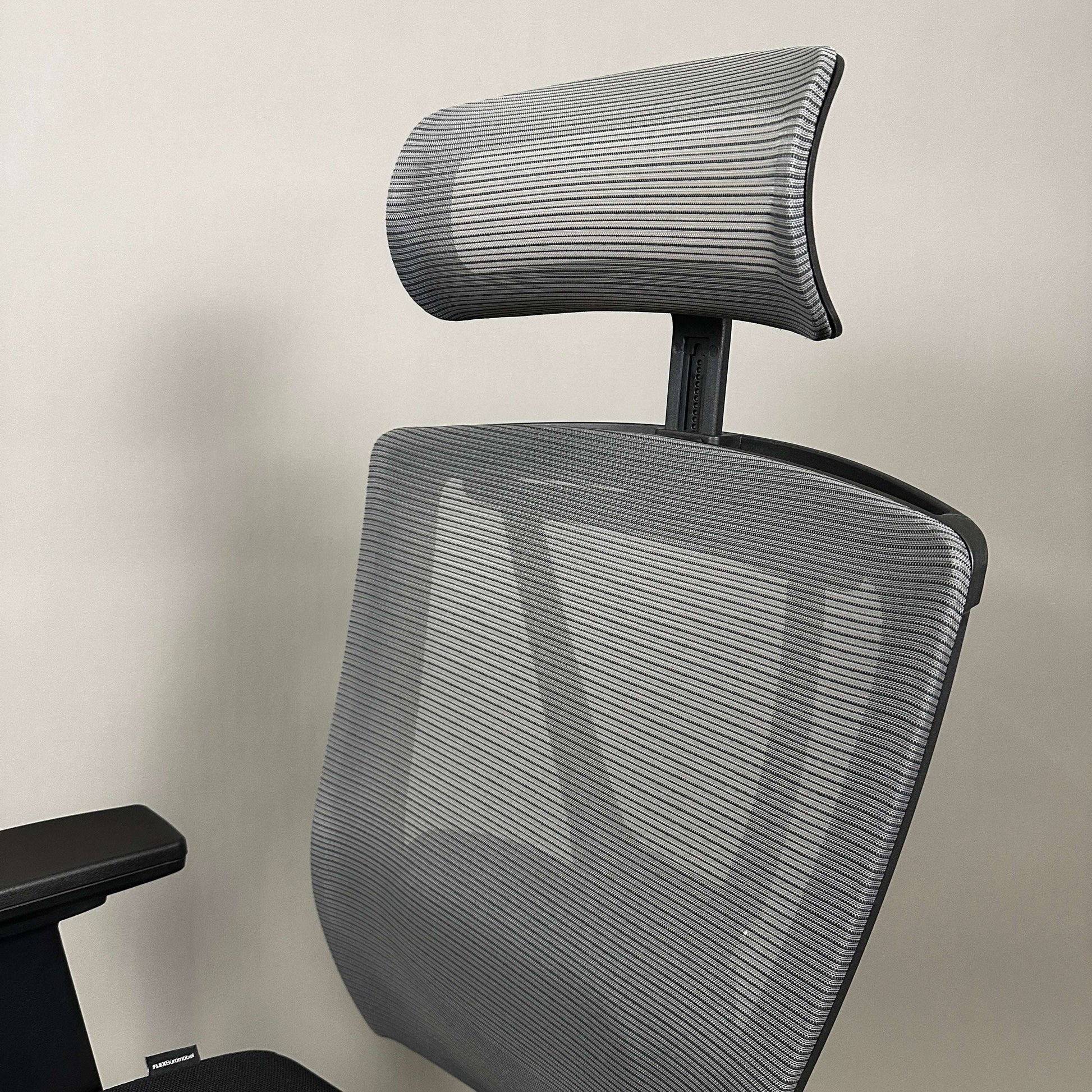 ergonomic black mesh office chair with adjustable headrest and lumbar support ergo1 schwarz