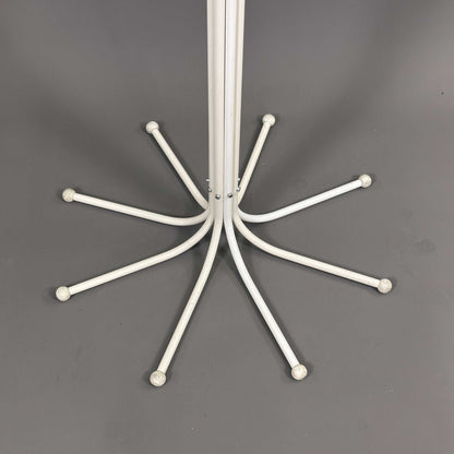 White Fritz Hansen Coat Tree stand with curved hooks on gray background