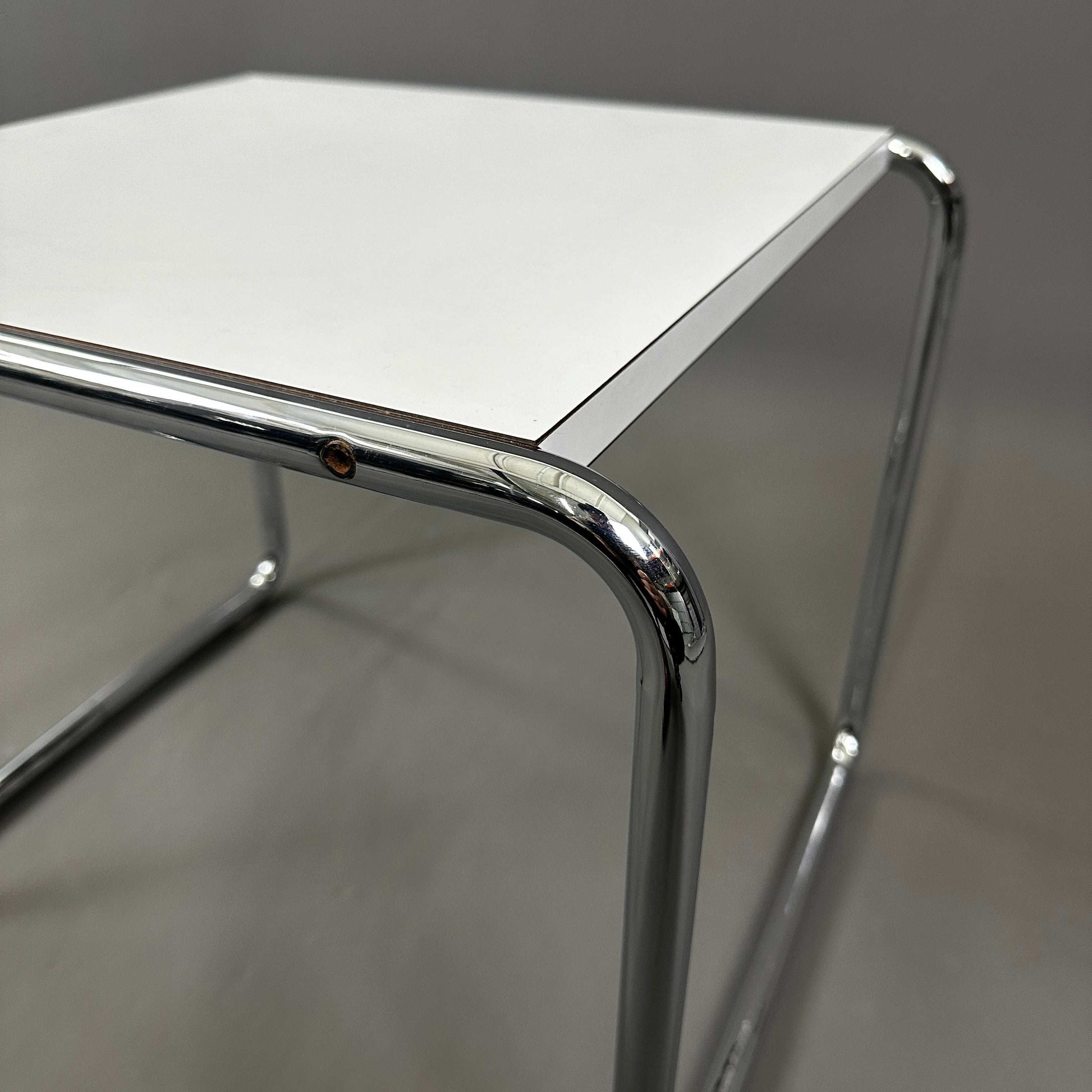 Knoll Breuer Laccio side table with white lacquered top and chrome tubular steel frame