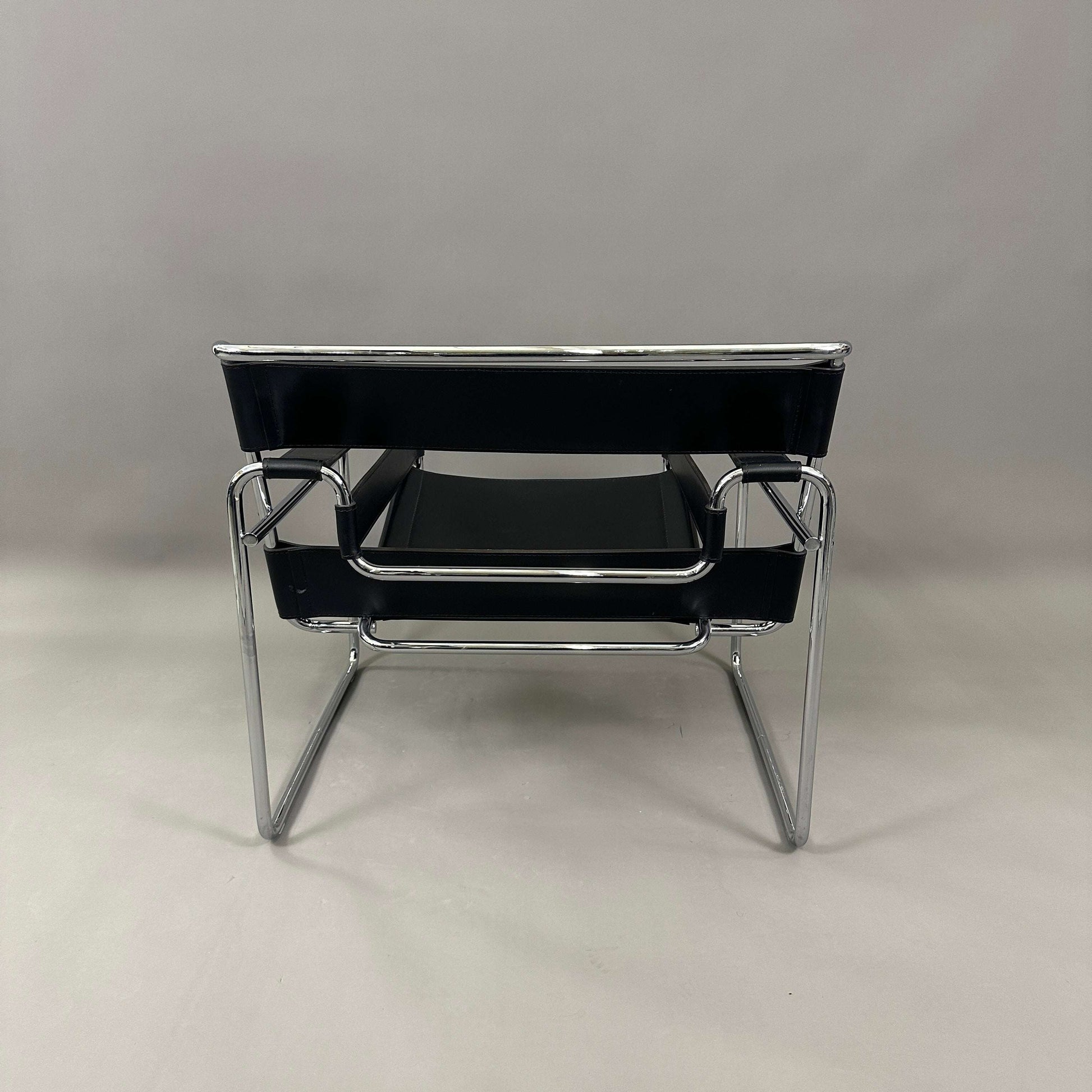 Knoll Wassily Chair with black leather seat and chrome frame viewed from front