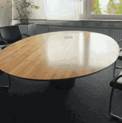runder Konferenztisch Holz schwebend 220x160cm mit moderner Optik im Büro