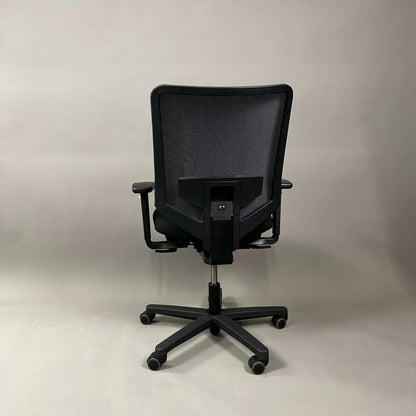 König & Neurath Jet ergonomic black office chair with mesh back and adjustable armrests viewed from the rear