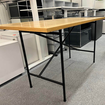 Lampert Eiermann desk with black metal frame and oak veneer tabletop measuring 140x70cm in modern office setting
