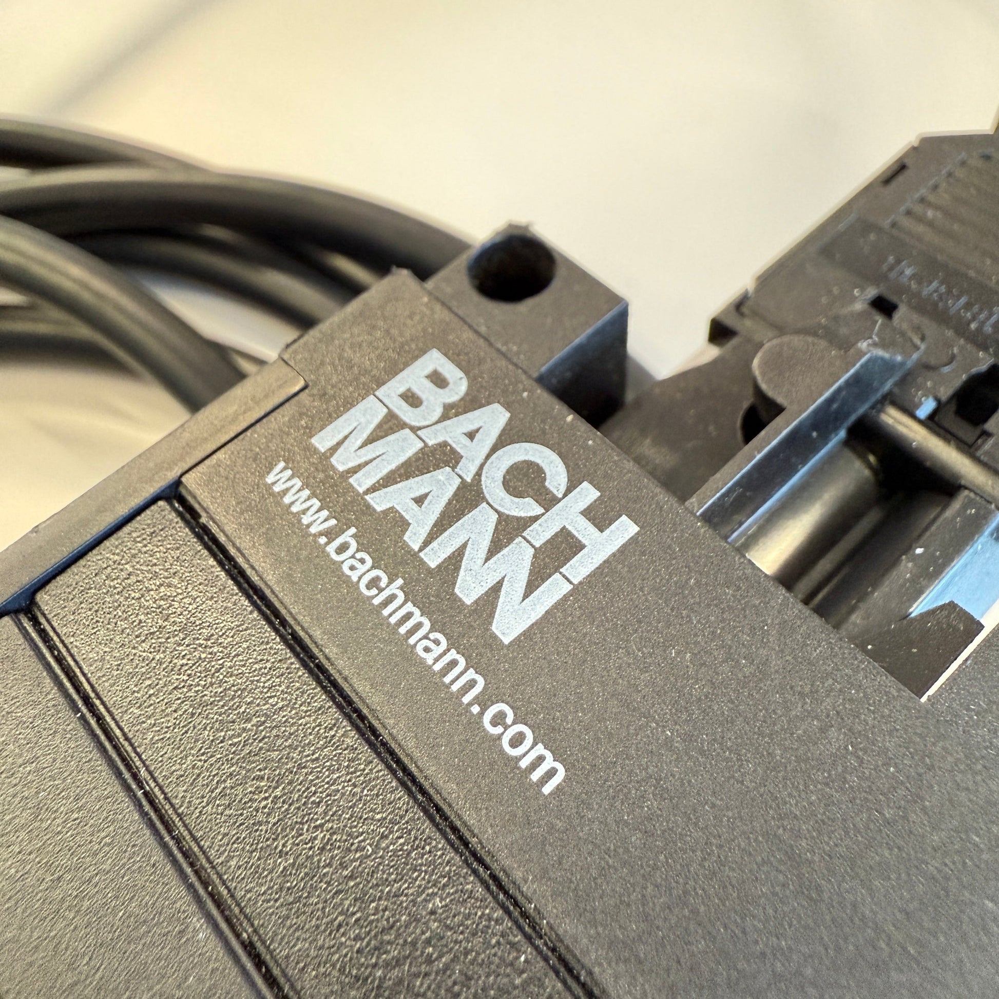 Black Bachmann Mehrfachsteckdose power strip with four protective sockets and integrated cable