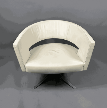 Montis Turner Sessel aus hellbeigem Leder mit mattem Aluminiumgestell und moderner Drehfunktion