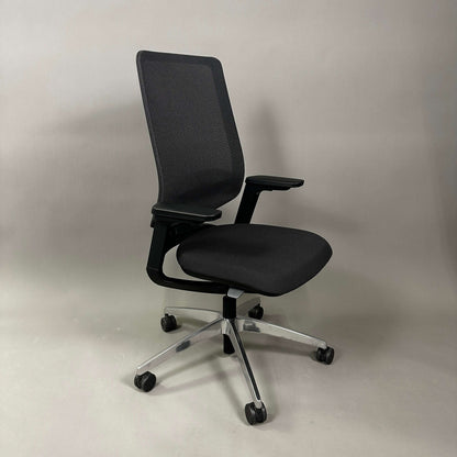 Black SEDUS se:flex ergonomic office chair with adjustable height, depth, 3D armrests, lumbar support, and hard floor caster wheels.