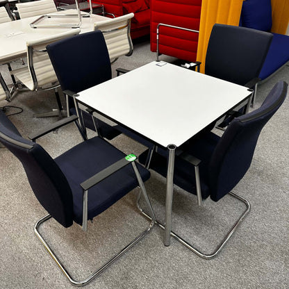 Sedus Freischwinger modern office chairs with ergonomic design around white square table