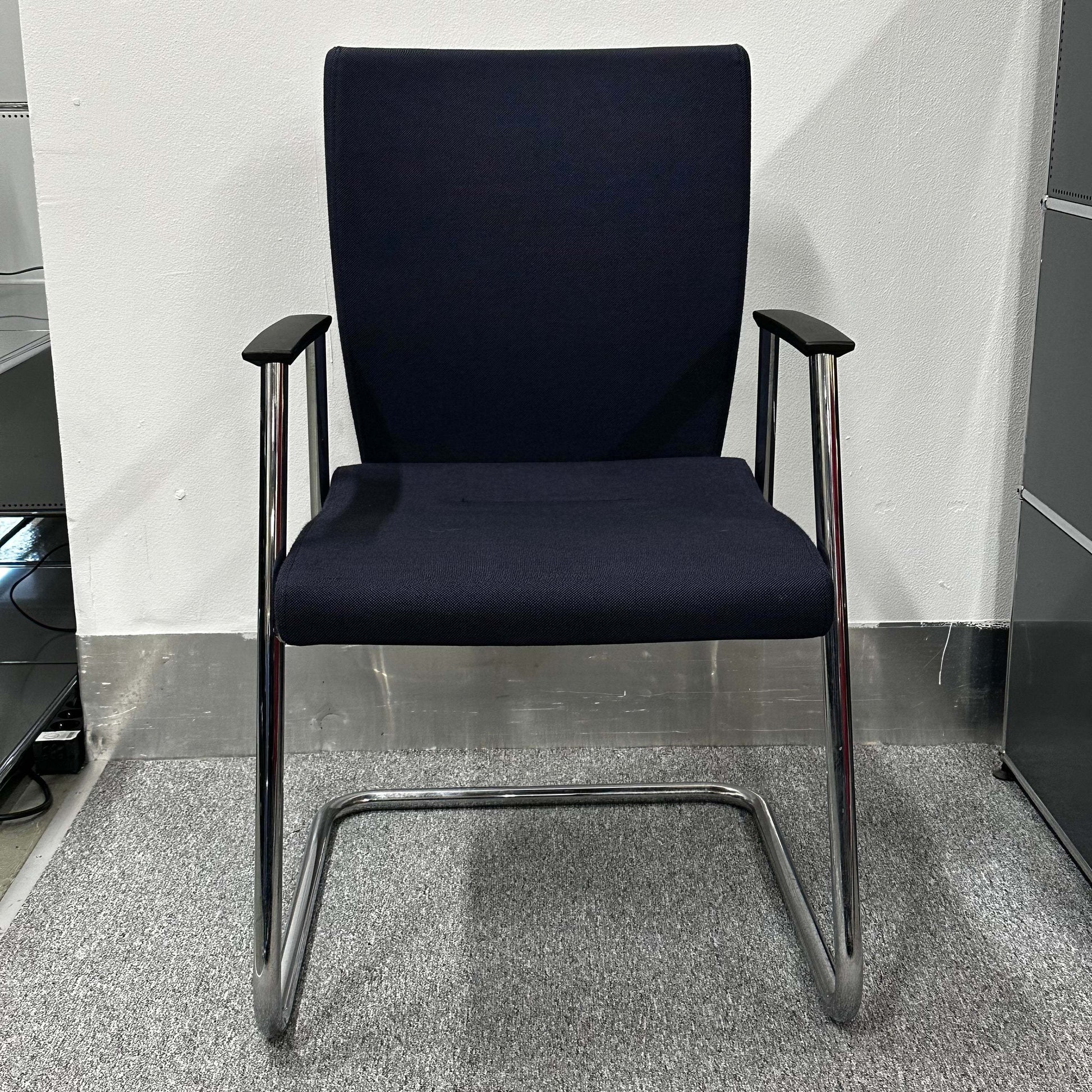 Sedus Freischwinger ergonomic black office chair with chrome cantilever frame and armrests