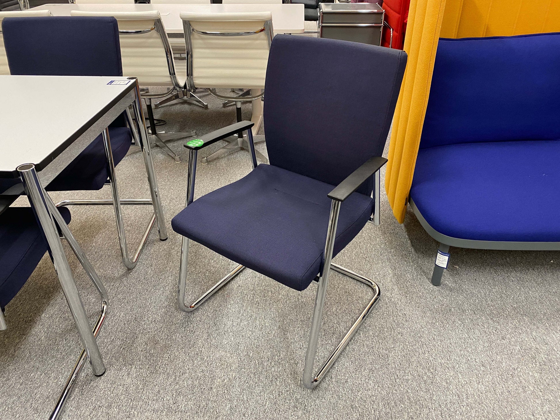 Sedus Freischwinger ergonomic office chair with navy blue fabric and chrome cantilever frame