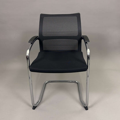 Sedus OpenUp Freischwinger chair with black mesh backrest and chrome frame