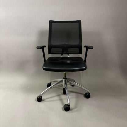 Sedus open up office chair with black mesh backrest, black leather seat, and polished aluminum base