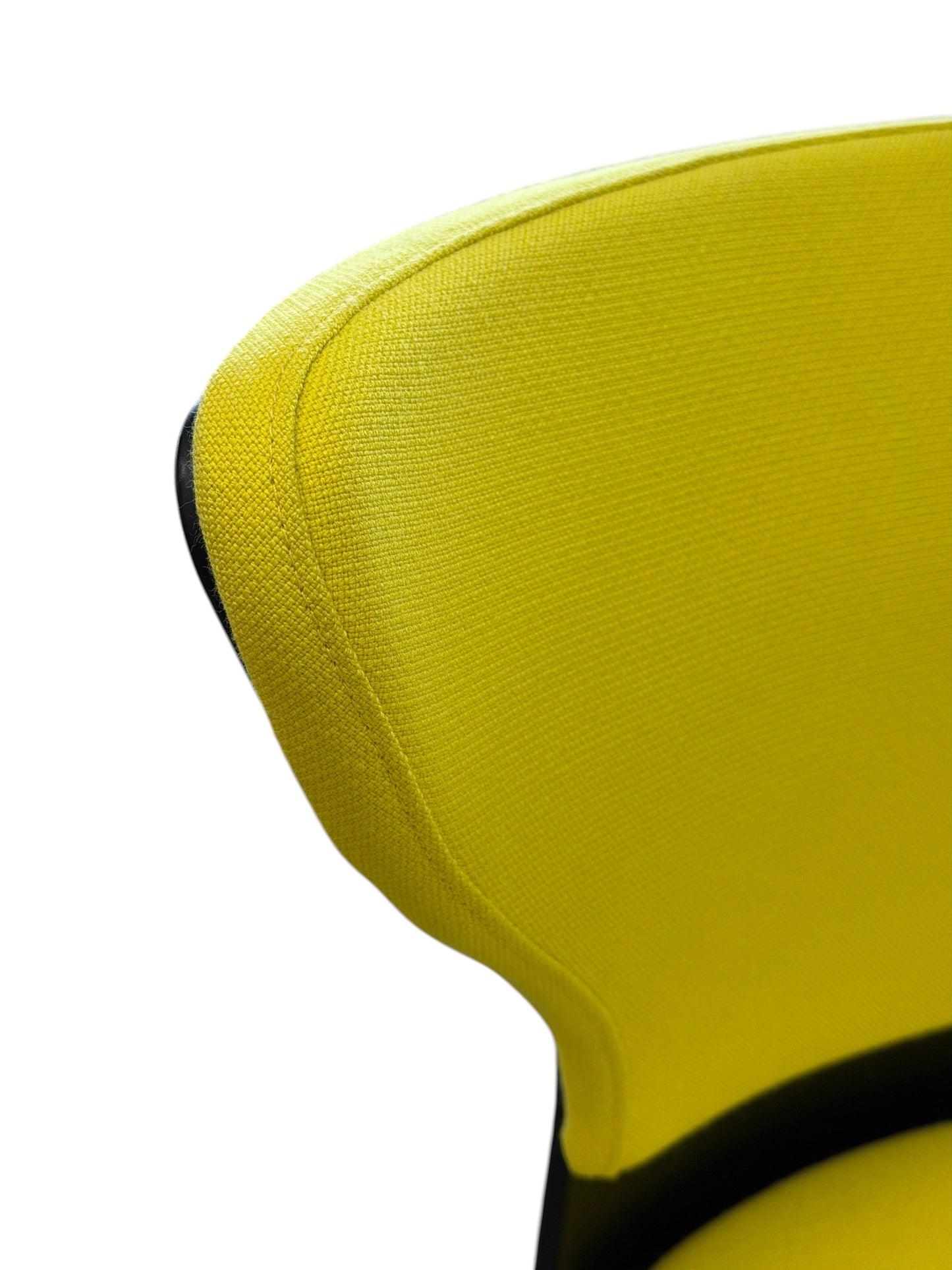 Close-up of a Sedus Turn around 181 high desk chair in vibrant gelb fabric with black polypropylene accents.