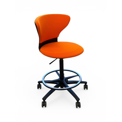 Sedus Turn around 181 high desk chair in vibrant orange fabric with black base and footring.