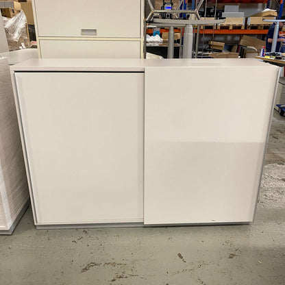 White sideboard 120cm with three open compartments and sliding doors in modern design