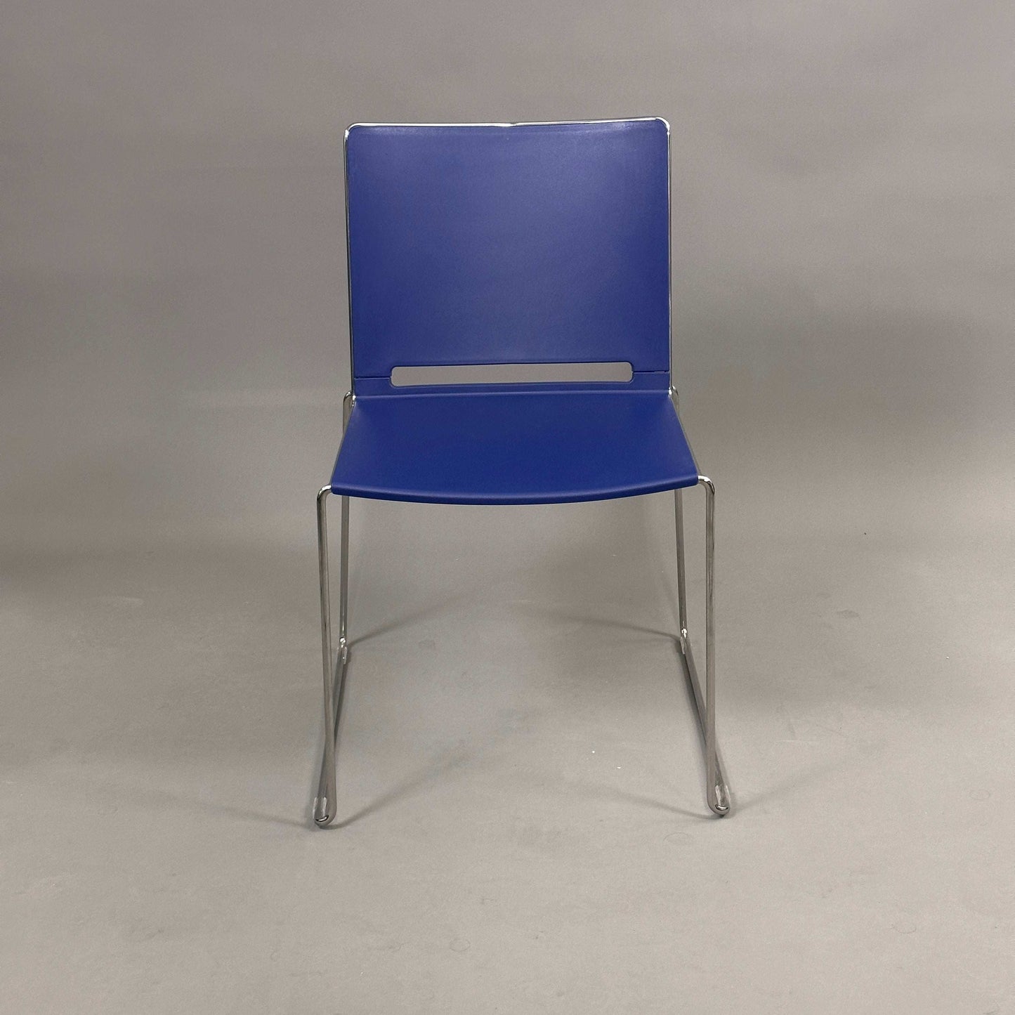 Blue Stapelstuhl Serie8000 stacking chair with metal legs and rectangular cutout backrest