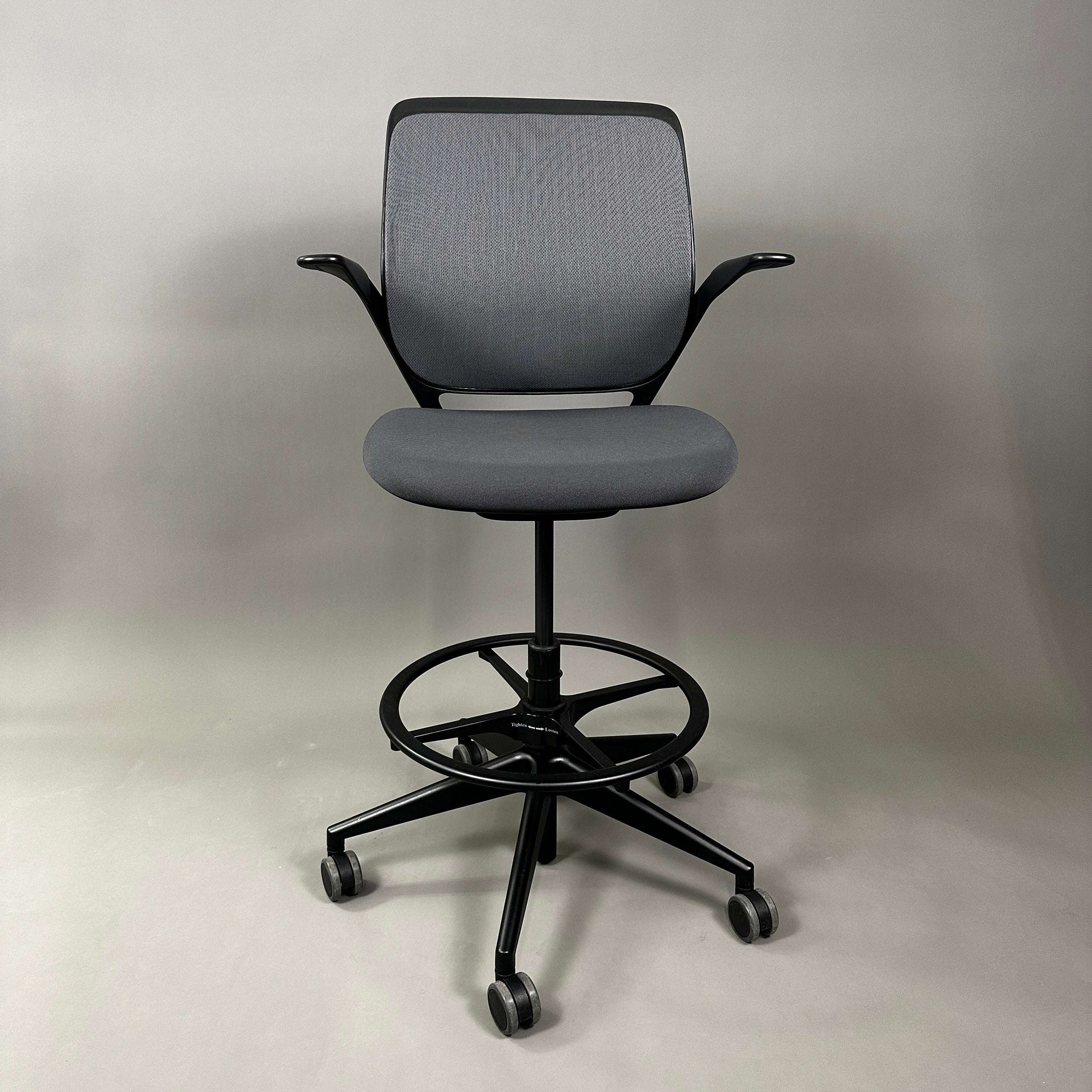 Steelcase Cobi ergonomic office chair with adjustable height, black frame, grey fabric seat, and mesh backrest on casters