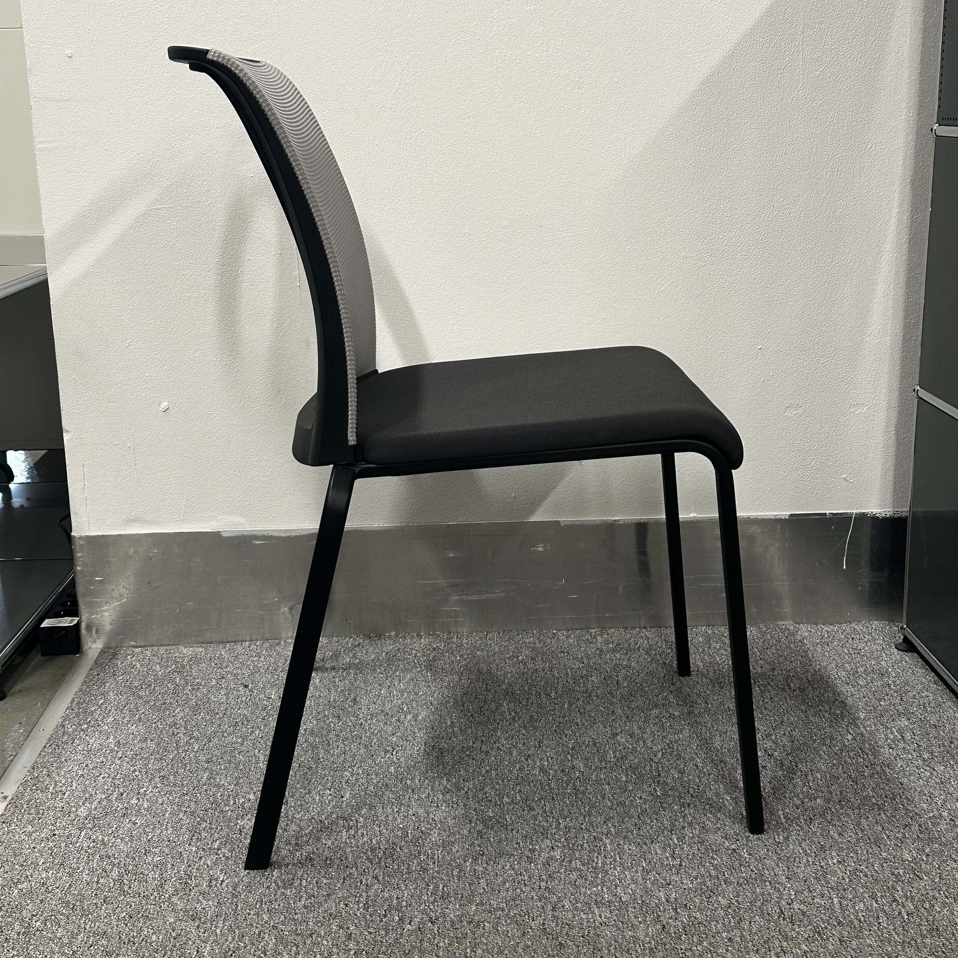 Steelcase Eastside Stapelstuhl modern stackable black office chair with mesh back and cushioned seat