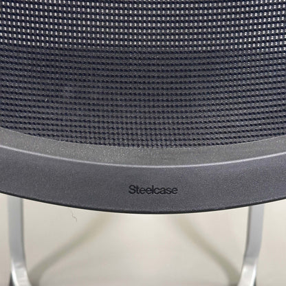 Steelcase Northside black mesh back meeting chair with silver frame and stackable design