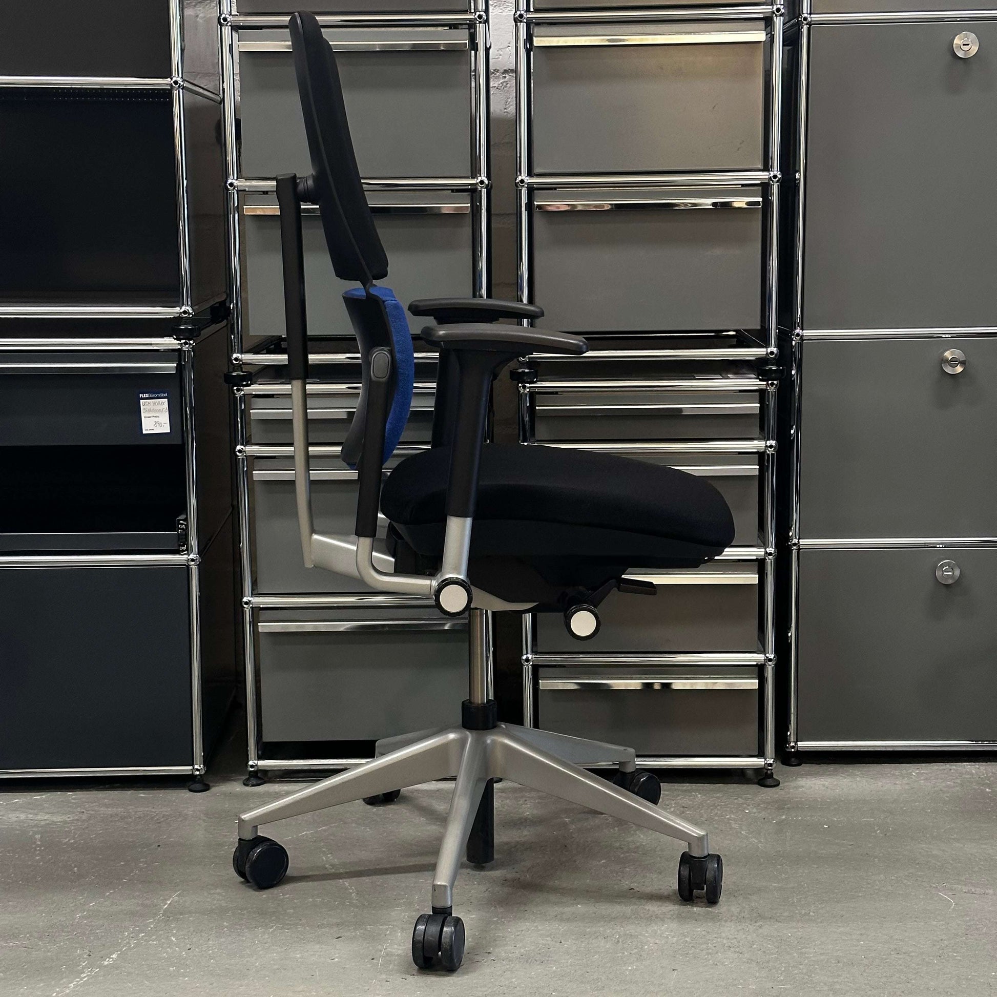Steelcase Please ergonomic office chair with adjustable features and modern design in black and blue