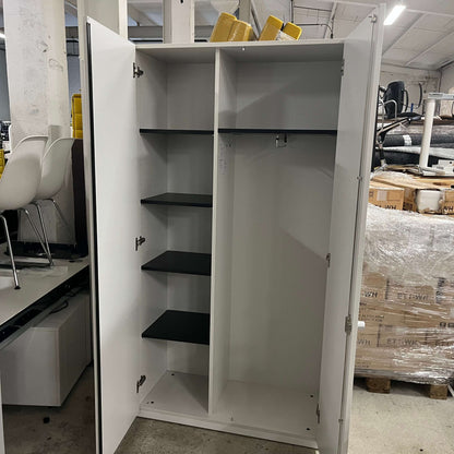 Steelcase Schrank gray wardrobe cabinet with black shelves and hanging rail open doors in storage room