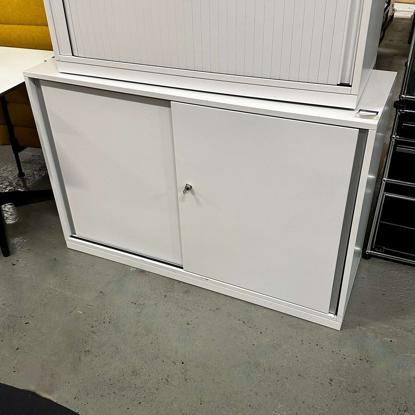 White Steelcase Sideboard 2OH with 120cm width and sliding doors in office setting