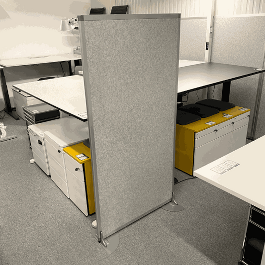 Gray modular Stellwand partition with stand feet in office space for sound and privacy protection, size 80x160 cm