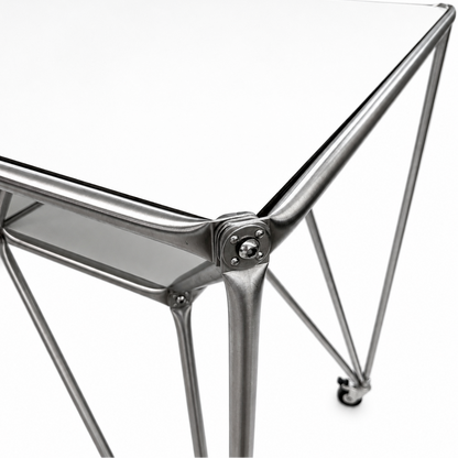 System 180 DT-Line Table T4, modern silver metal frame, white top, industrial design, on casters.