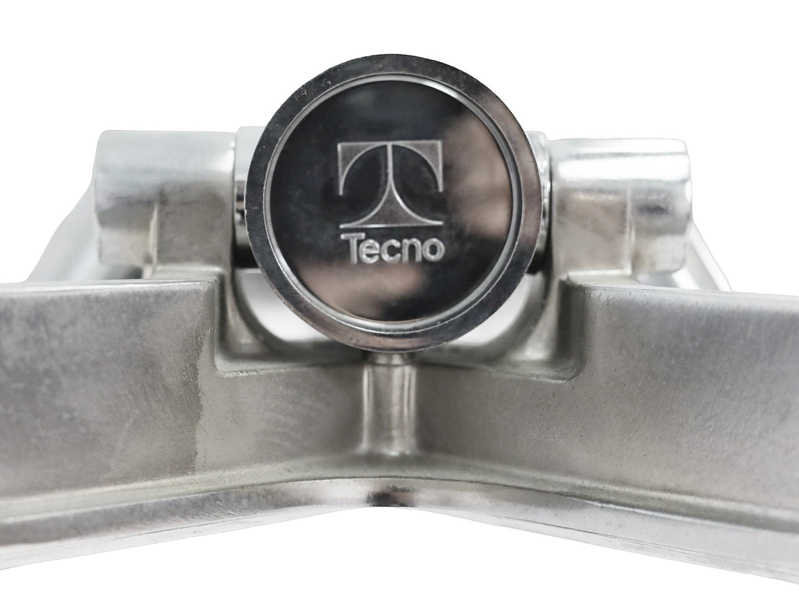Nahaufnahme des silbernen Tecno Nomos Glastisch-Gestells aus Stahl mit eingeprägtem Tecno-Logo.