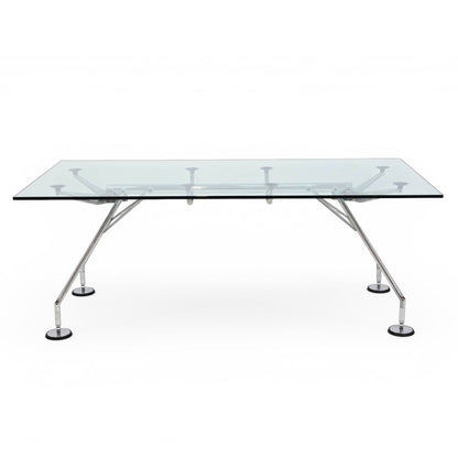Tecno Nomos Norman Foster Glastisch: transparenter Tisch mit silbernem Stahlgestell.