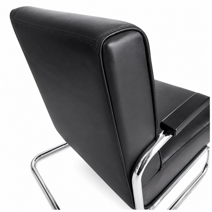 Thonet S 411 Freischwinger Sessel aus schwarzem Leder mit verchromtem Stahlrohrgestell.