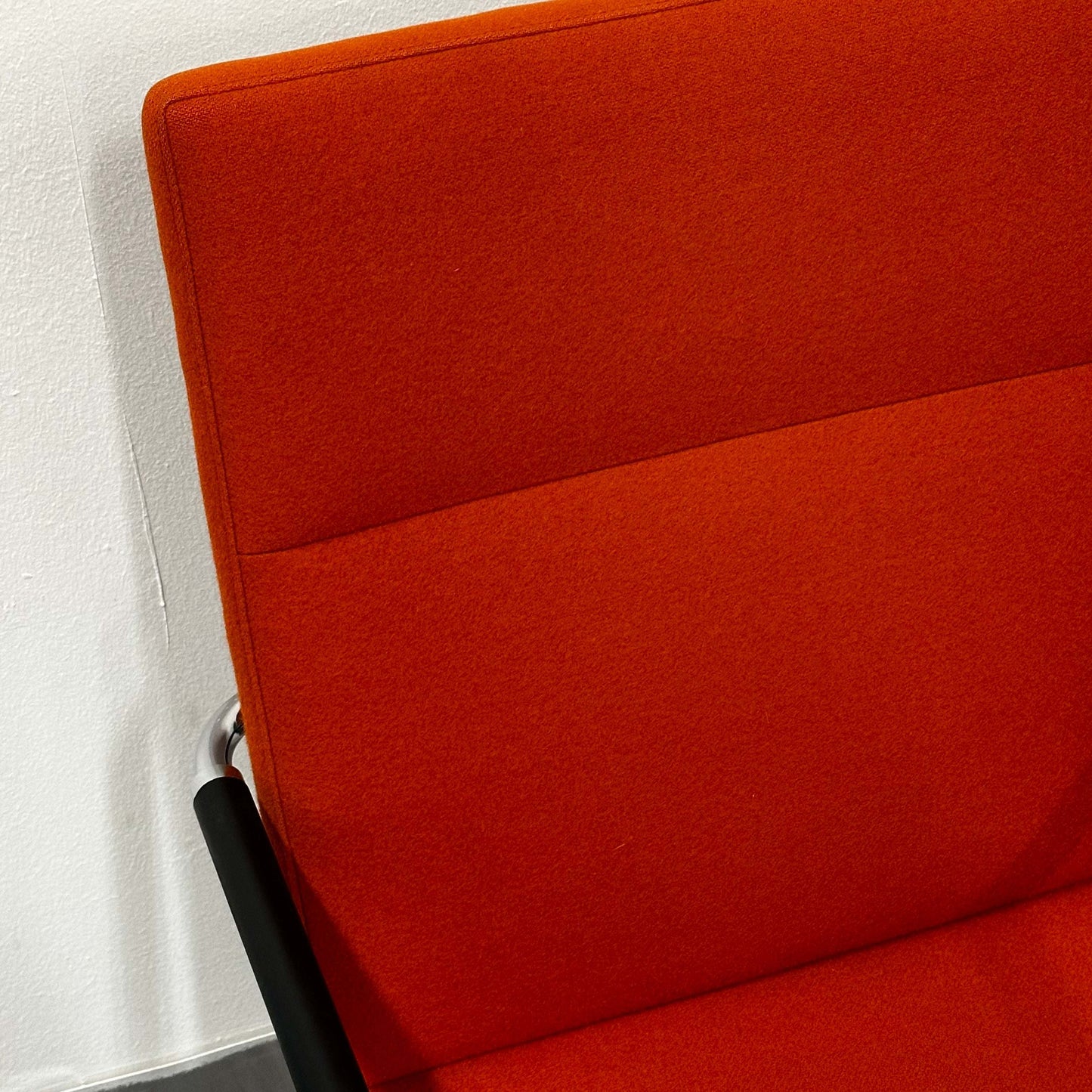 Thonet S60 chair with deep orange fabric and chrome frame, stackable design, discounted sale price
