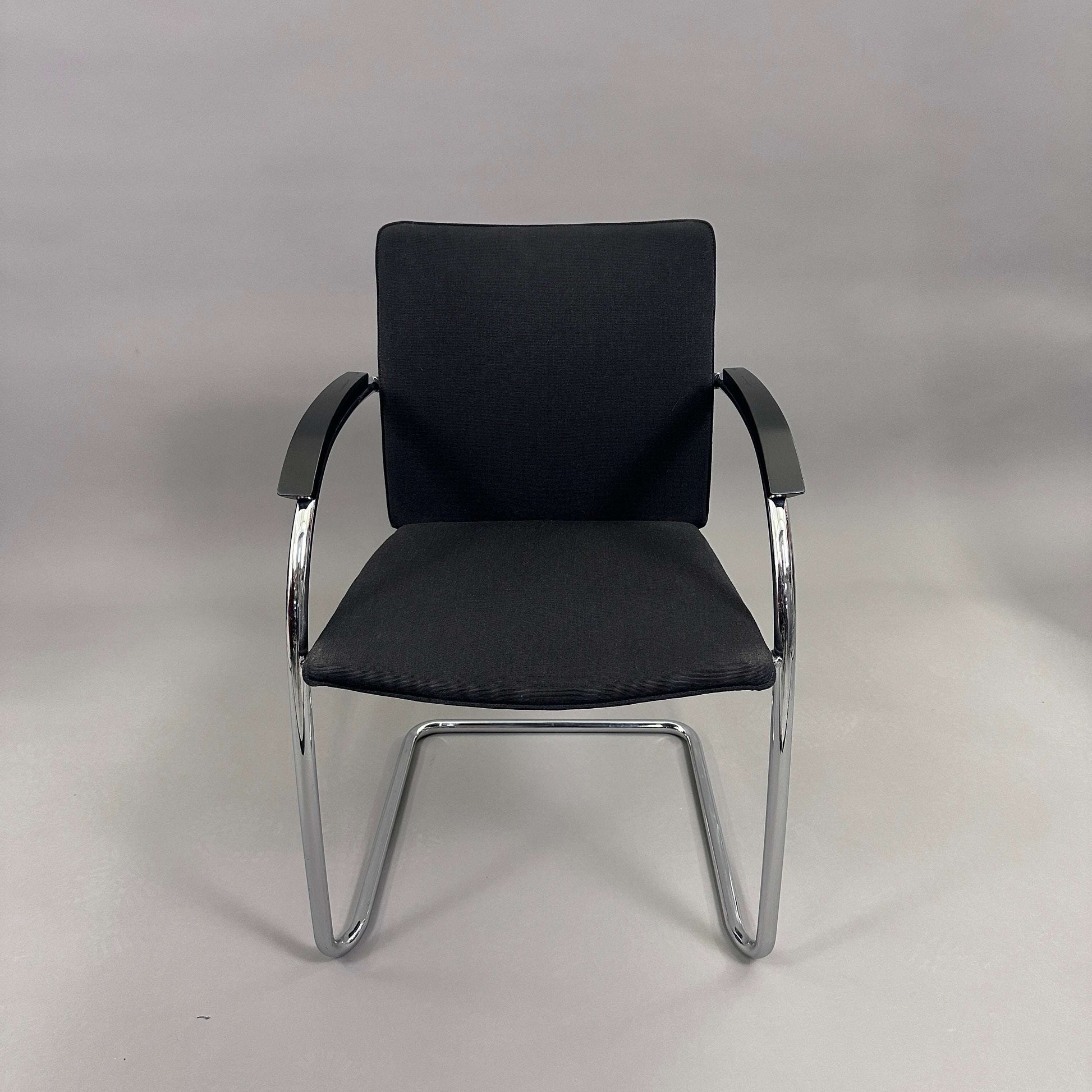 Thonet S78/S79 chair with black upholstery, matte black wooden armrests, and chrome frame