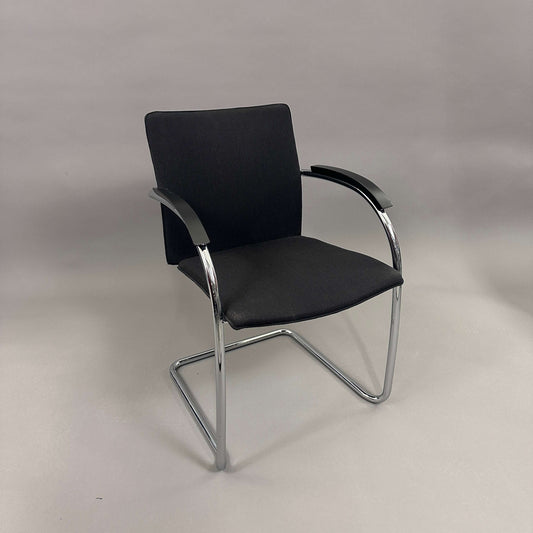 Black upholstered Thonet S78/S79 chair with matte black wooden armrests and chrome cantilever frame