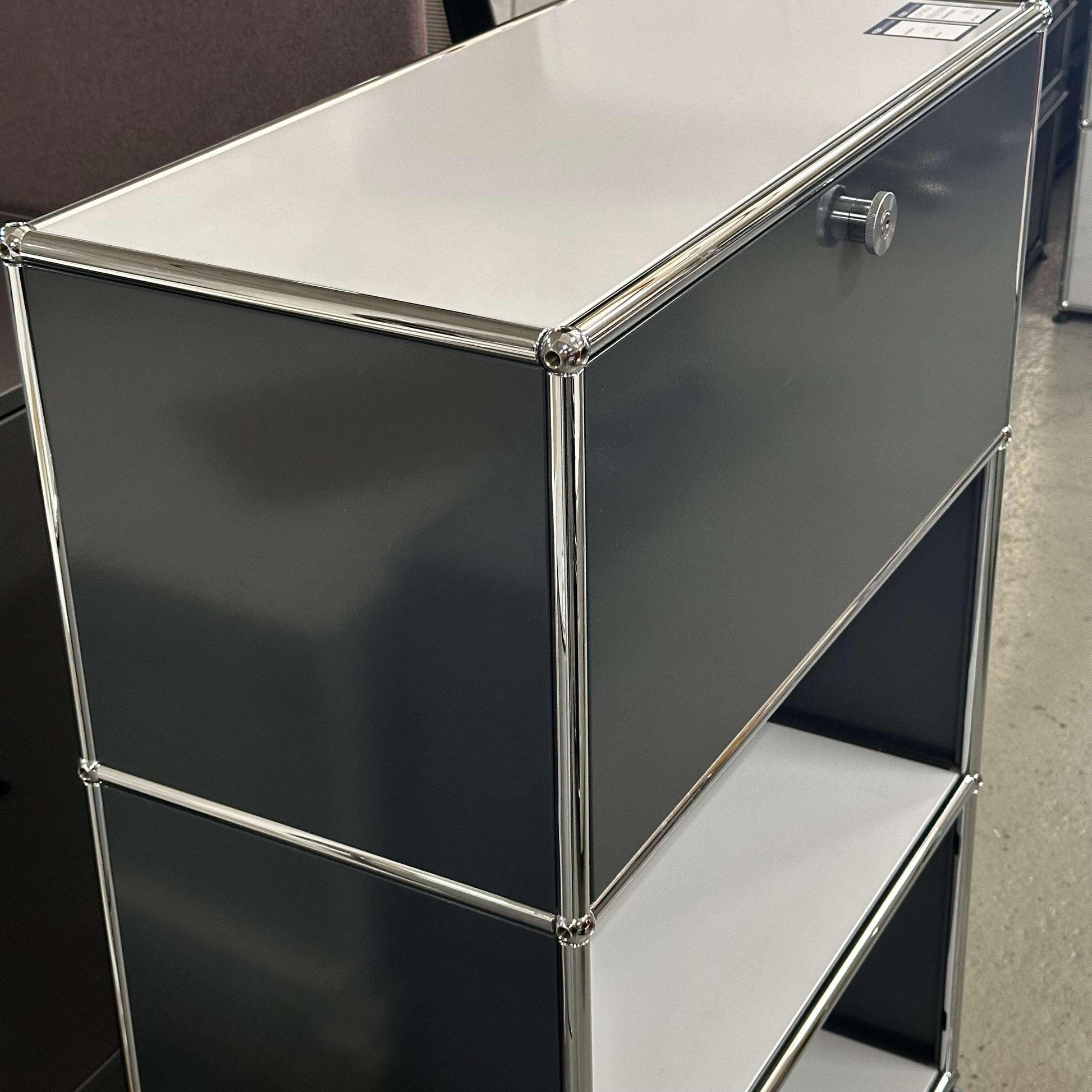 USM Haller High Board in light gray and anthracite with chrome frame and drawer knob