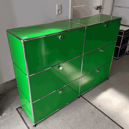 USM Haller green highboard with six soft-close compartments and metal frame