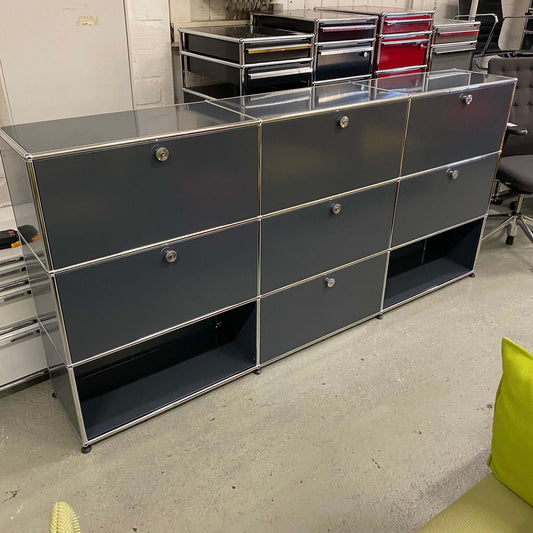 USM Haller anthracite highboard with 3x3 compartments, 6 flap doors, and 1 drawer, measuring 227x109x35cm