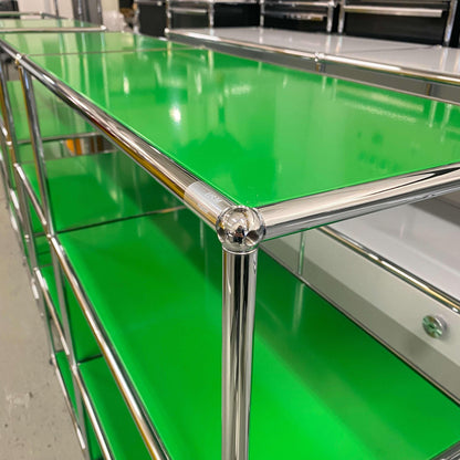 USM Haller Highboard in green with chrome frame, 2x3 open shelves, measuring 128x109x38 cm