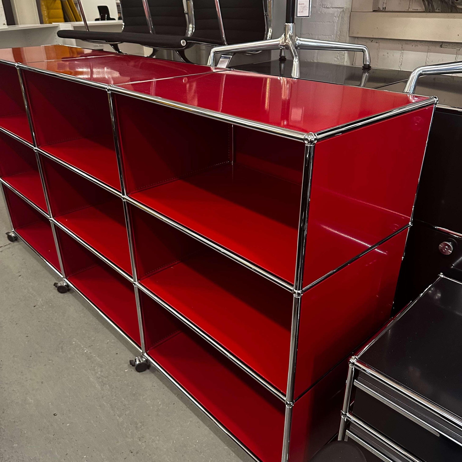 Red USM Haller Highboard with 9 open compartments and lockable caster wheels
