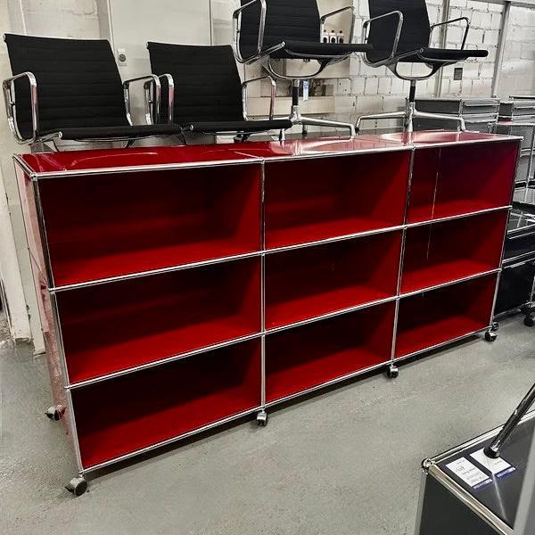 Red USM Haller Highboard with nine open shelves and lockable caster wheels