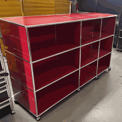 USM Haller Highboard in red with 9 open compartments and lockable caster wheels