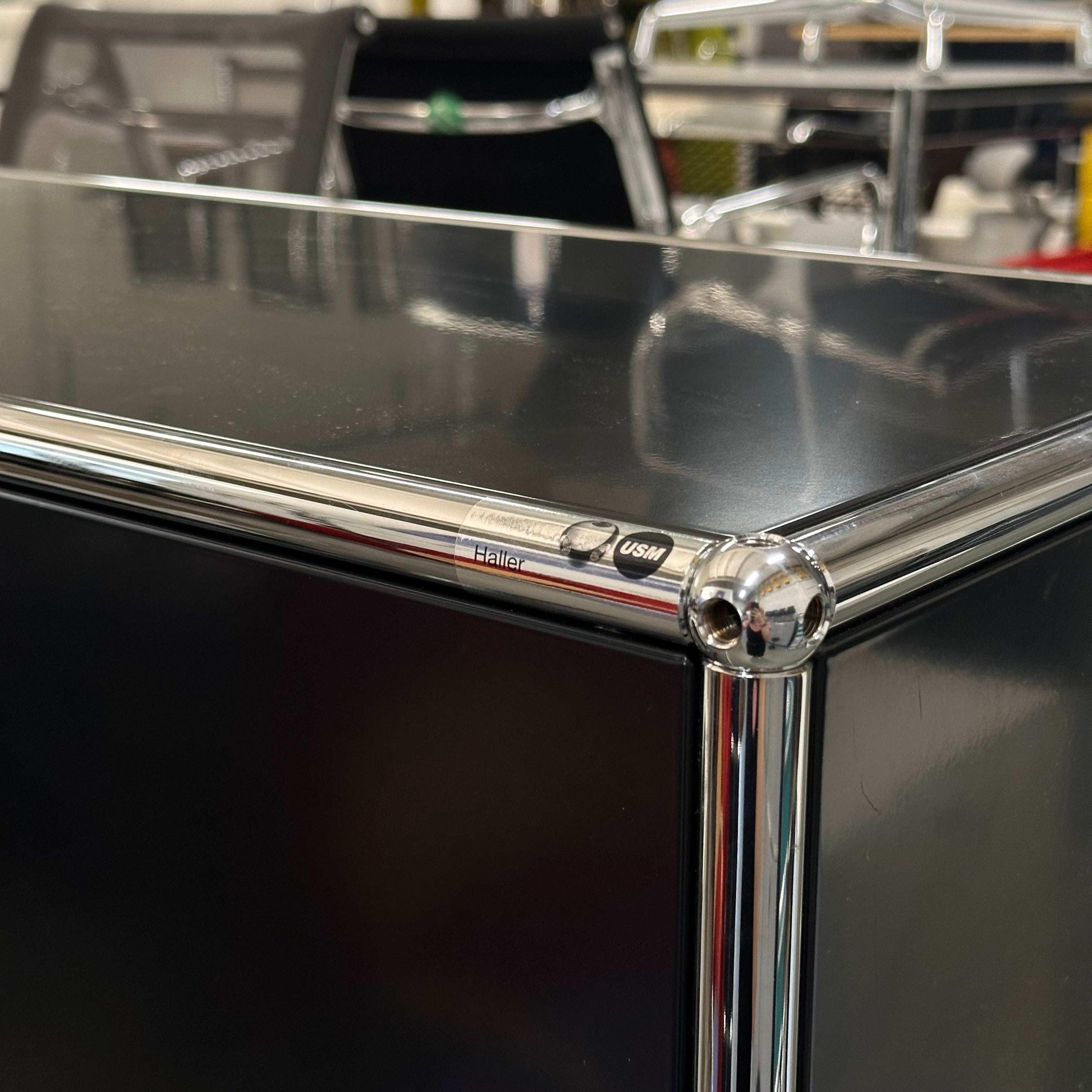 Black USM Haller Highboard with chrome frame and three flap doors, 35cm deep