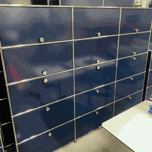 USM Haller Highboard in steel blue with 9 flap doors and 6 sliding doors measuring 179x228x38cm