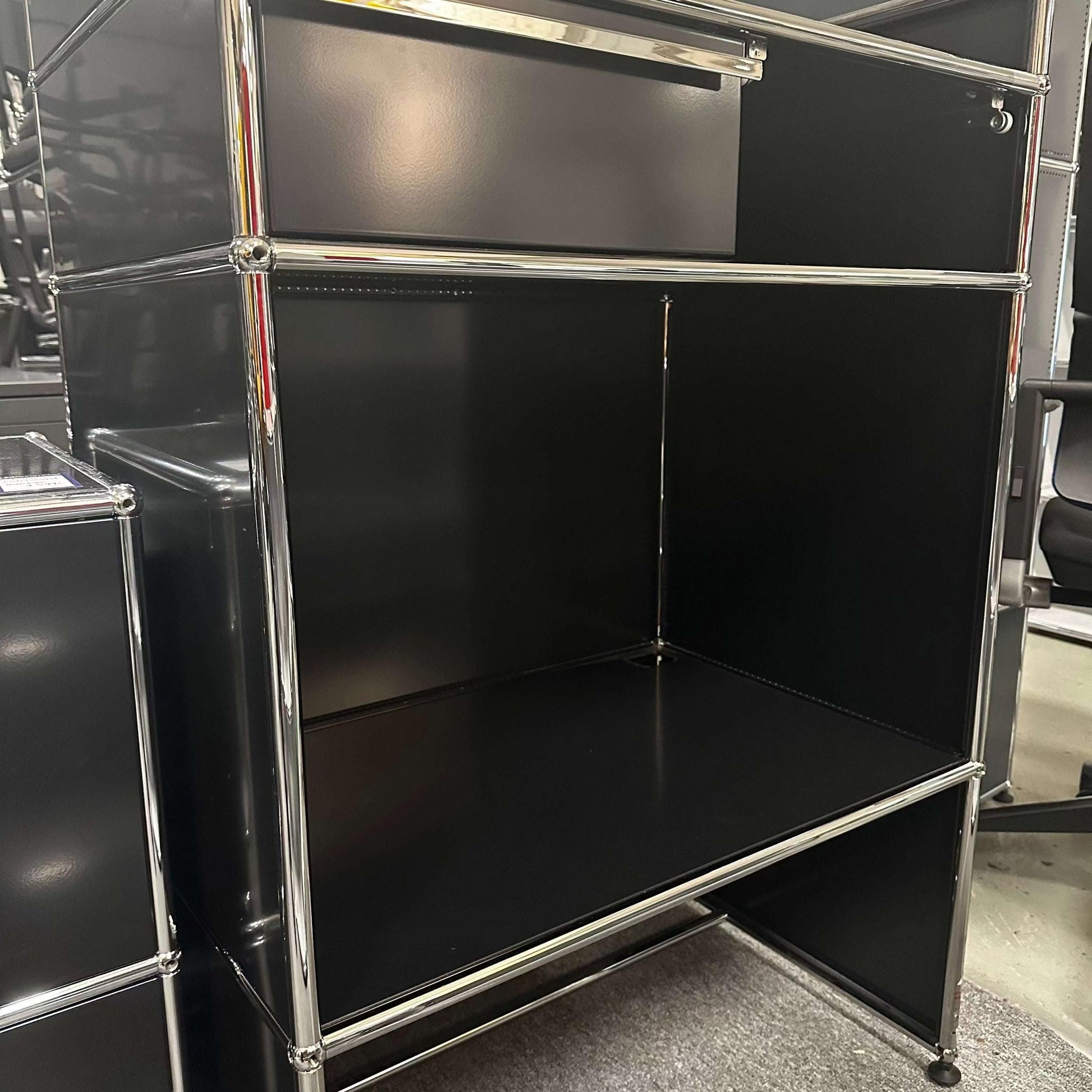 USM Haller Pult highboard in graphite black with chrome frame, dimensions 77x117x52cm