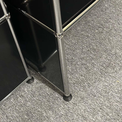 USM Haller Pult highboard in graphit black with metal frame on gray carpet floor