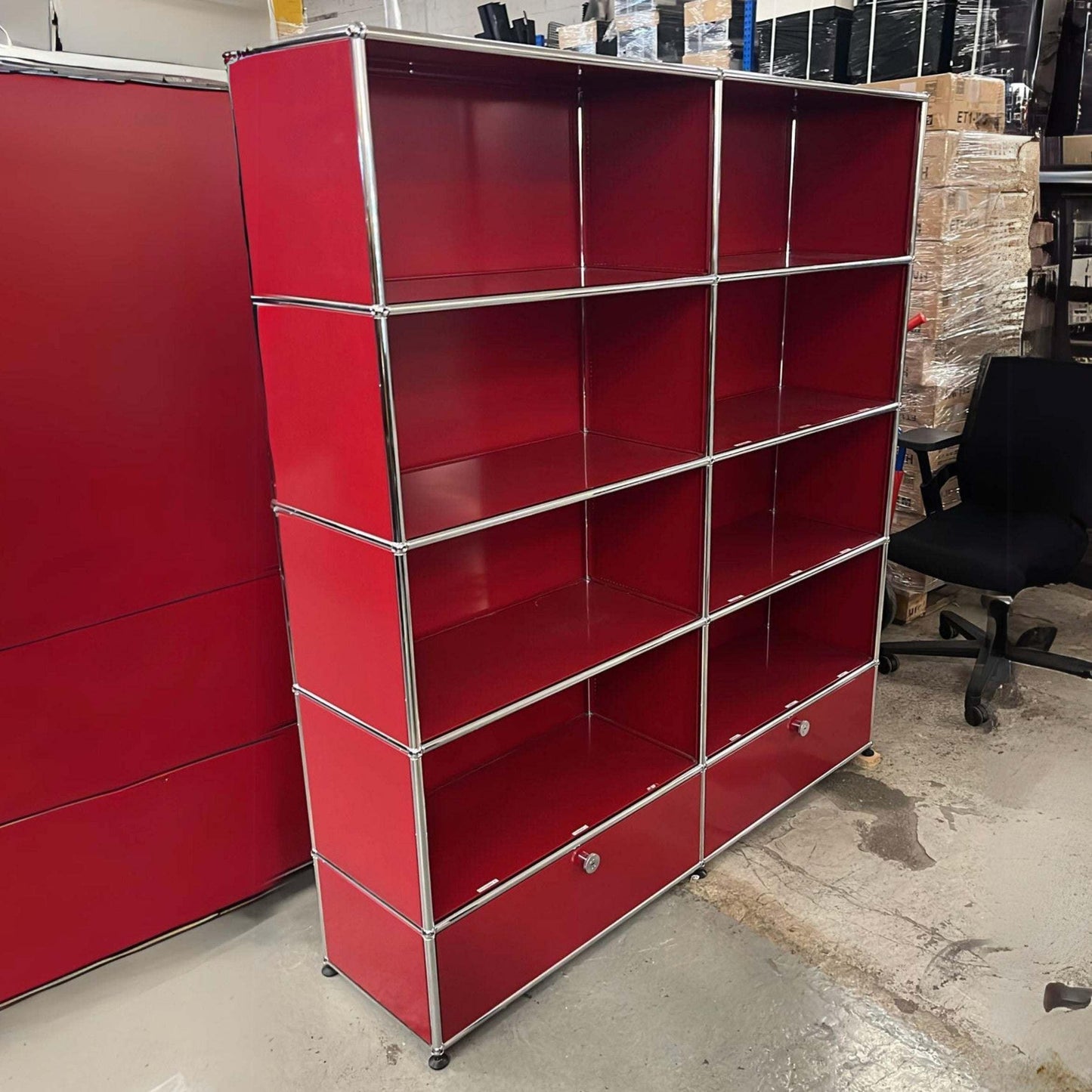 Red USM Haller Regal with 2 flap doors, 8 open compartments, and lockable caster wheels